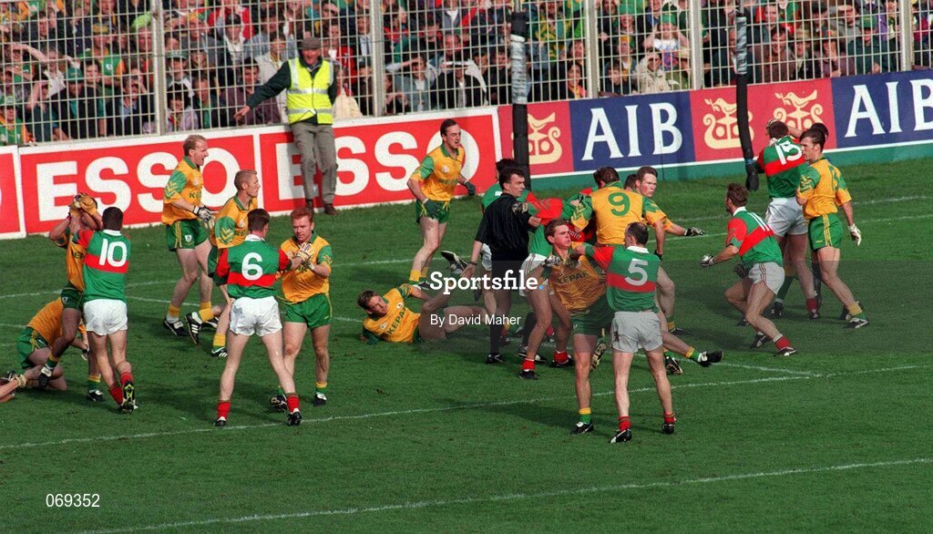 29 September 1996; An altercation between Meath and Mayo players early in the game which resulted in Meath's Colm Coyle and Mayo's Liam McHale being sent off by referee Pat McEnaney. All Ireland Football Final replay Croke Park, Meath v Mayo, Croke Park, Dublin. Picture credit; David Maher / SPORTSFILE