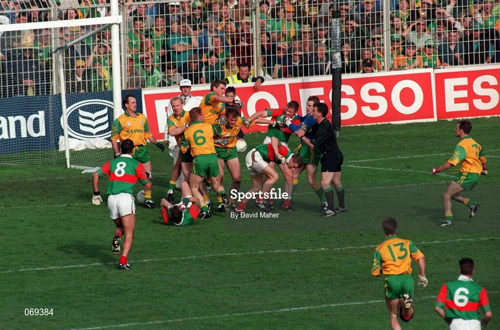 29 September 1996; An altercation between Meath and Mayo players early in the game which resulted in Meath's Colm Coyle and Mayo's Liam McHale being sent off by referee Pat McEnaney. Meath v Mayo, All Ireland Football Final replay, Croke Park, Dublin. Picture credit; David Maher / SPORTSFILE