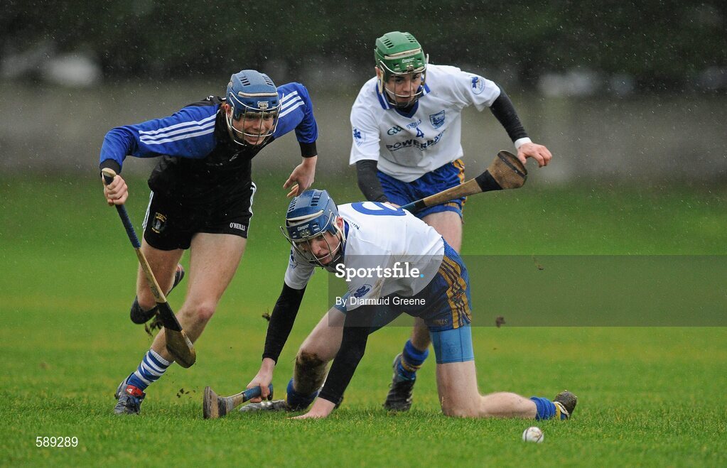 25 January 2012; Jason Forde, Nenagh CBS, in action against Seamus Kennedy and Brian Troy, right, Thurles CBS. Dr Harty Cup, Quarter-Final Replay, Nenagh CBS v Thurles CBS, The Ragg GAA Grounds, Thurles, Co. Tipperary. Picture credit: Diarmuid Greene / SPORTSFILE