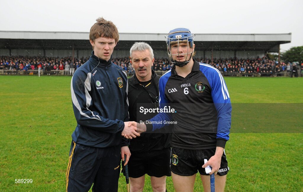 25 January 2012; Thurles CBS capatain John Meagher, left, and Nenagh CBS captain Jason Forde with referee Paddy Russell before the game. Dr Harty Cup, Quarter-Final Replay, Nenagh CBS v Thurles CBS, The Ragg GAA Grounds, Thurles, Co. Tipperary. Picture credit: Diarmuid Greene / SPORTSFILE