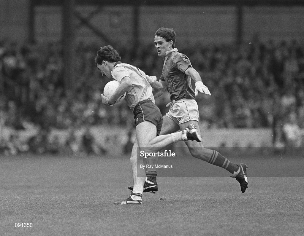 27 July 1986; Dave Synnott of Dublin is tackled by Meath's Finian Murtagh during the GAA Leinster Senior Football Championship Final match between Meath and Dublin at Croke Park in Dublin. Photo by Ray McManus/Sportsfile