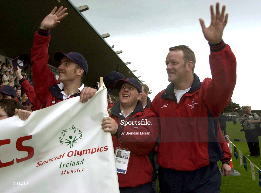19 June 2002; Munster and Irish lock Mick Galwey with Munster Special Olympics athletes John Gleeson, left, and Colin Hynes, centre, during the 2002 Special Olympics Ireland National Games Opening Ceremony at Parnell Park in Dublin. Photo by Brendan Moran/Sportsfile