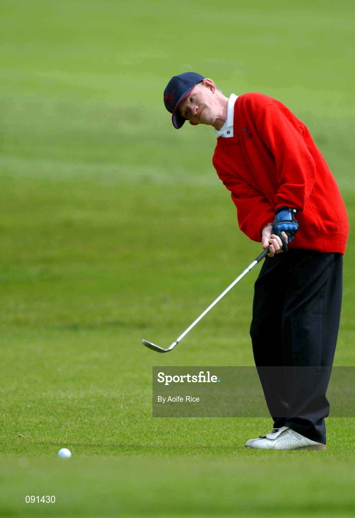 20 June 2002; Alan Punch of Cork chips onto the first green during the 2002 Special Olympics Ireland National Games at Elm Green Golf Club in Castleknock, Dublin. Photo by Aoife Rice/Sportsfile