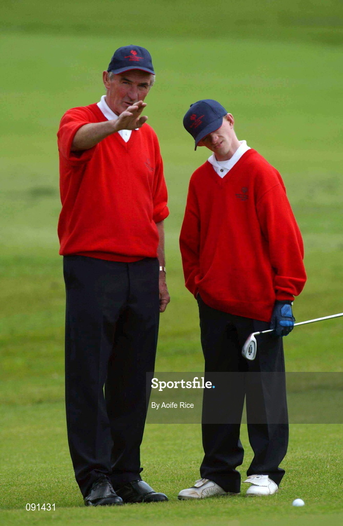 20 June 2002; Alan Punch of Cork, right, receives instruction from his partner Pat Murphy, also of Cork, on the 1st hole during the 2002 Special Olympics Ireland National Games at Elm Green Golf Club in Castleknock, Dublin. Photo by Aoife Rice/Sportsfile