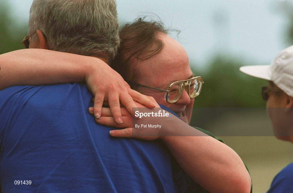 20 June 2002; Special Olympics athlete Andrew McHale shows his delight as he is congratulated by volunteer Dermot Kerins after he crossed the finish line to win the 25m Walk, Division 18, Preliminary Round, at Morton Stadium in Santry, Dublin, during the 2002 Special Olympics Ireland National Games. Photo by Pat Murphy/Sportsfile