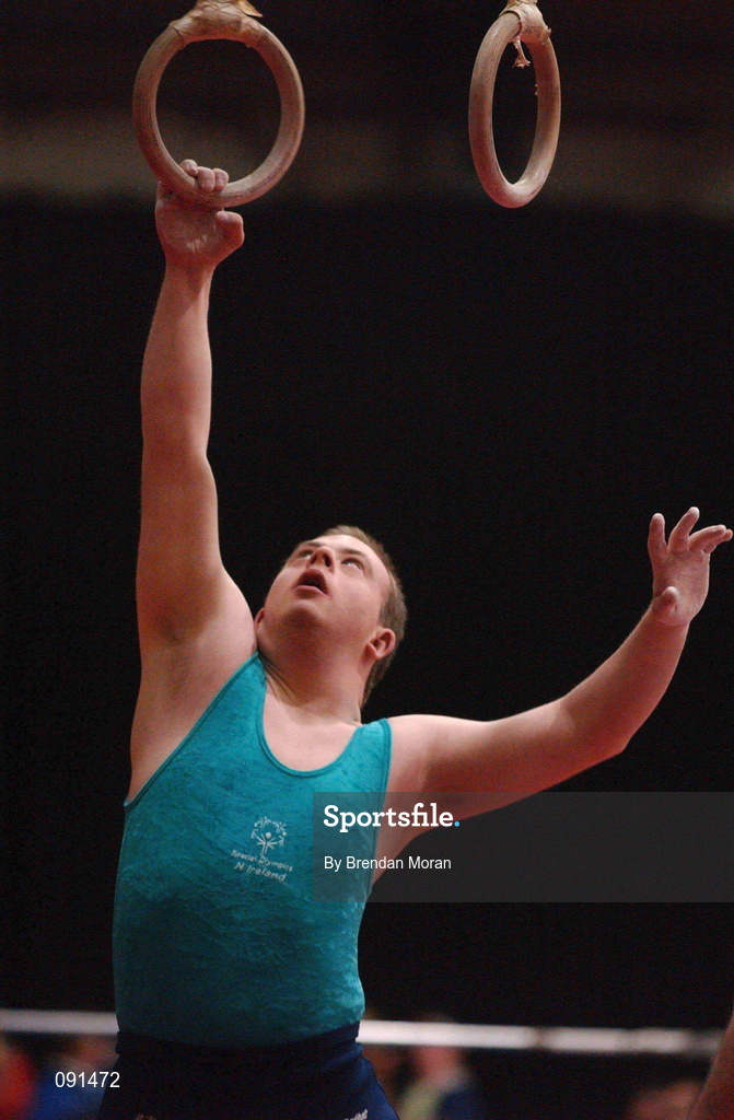 21 June 2002; Paul Ewbanks, Banbridge, Co. Down, reaches for the rings during the 2002 Special Olympics Ireland National Games Gymnastic events at the RDS in Dublin. Photo by Brendan Moran/Sportsfile