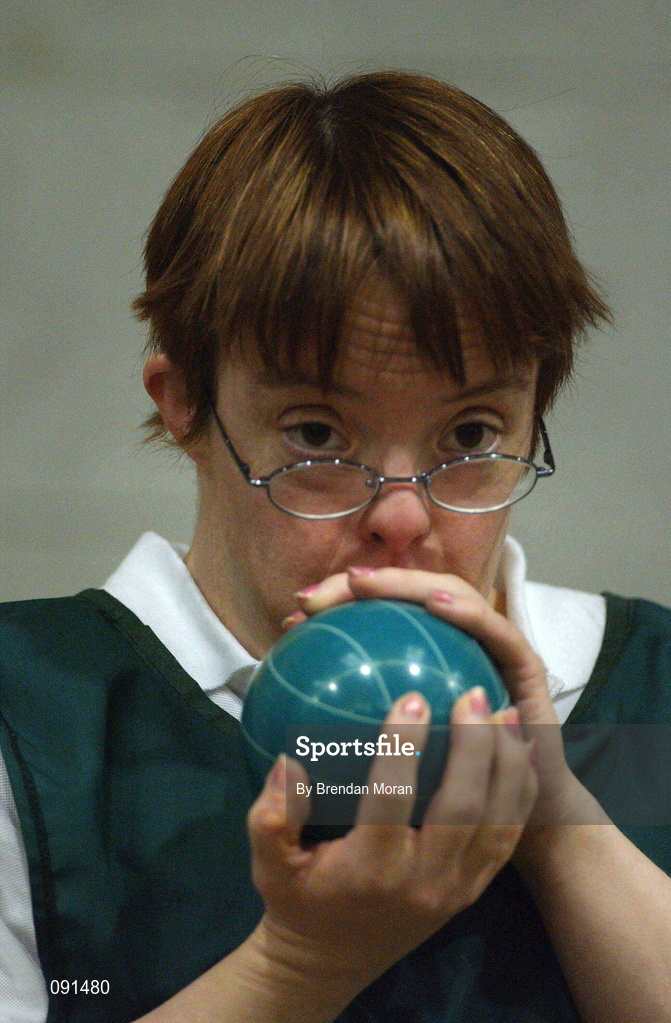 21 June 2002; Dympna Browne, from Belfast, concentrates on her shot during the 2002 Special Olympics Ireland National Games Bocce event at the RDS in Dublin. Photo by Brendan Moran/Sportsfile