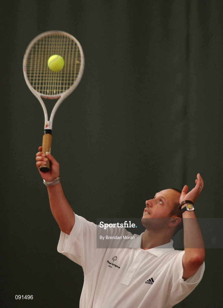 21 June 2002; Stephane Audibert of Monaco serves during the 2002 Special Olympics Ireland National Games Tennis Double semi-final event at Riverview Tennis Club in Clonskeagh, Dublin. Photo by Brendan Moran/Sportsfile