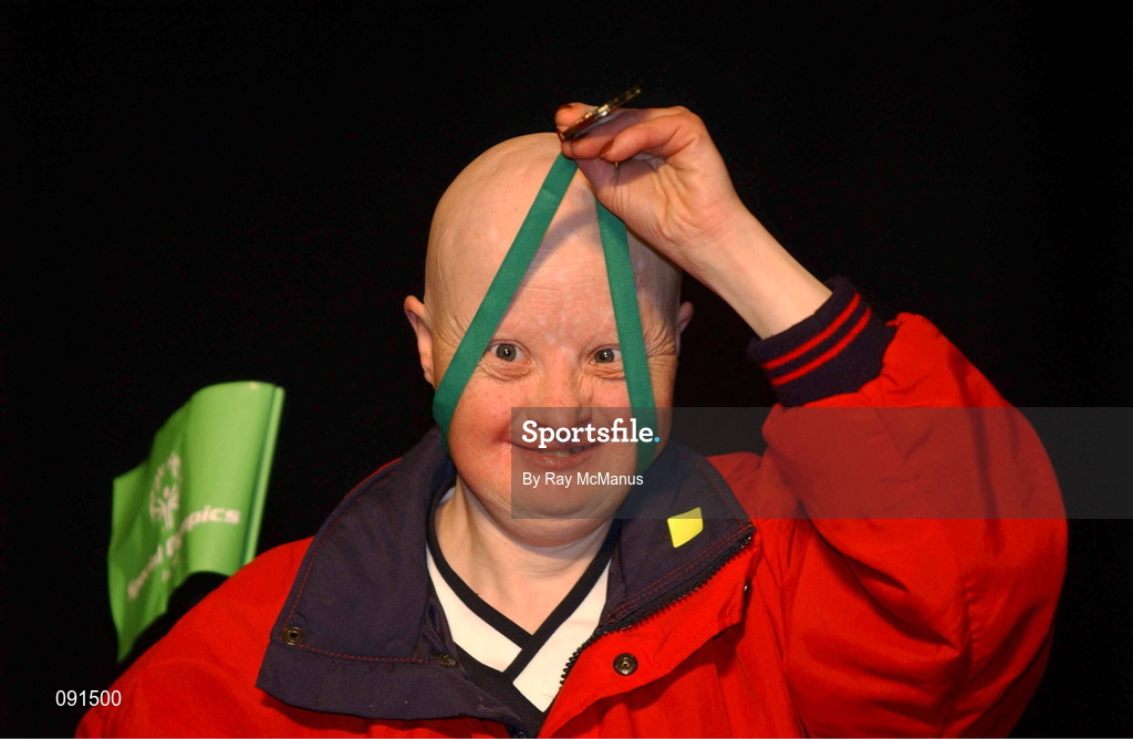 21 June 2002; Munster's Geraldine Harty, from Knocklong, Co. Limerick, celebrates her Gold Medal following the 2002 Special Olympics Ireland National Games gymnastics events at the RDS in Dublin. Photo by Ray McManus/Sportsfile