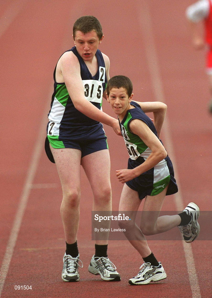 21 June 2002; Special Olympics athlete Jeffrey Graham of Antrim, right, receives the baton from his Ulster team-mate Robert Adams during the 4 x 100m relay race during the 2002 Special Olympics Ireland National Games at Morton Stadium in Santry, Dublin. Photo by Brian Lawless/Sportsfile