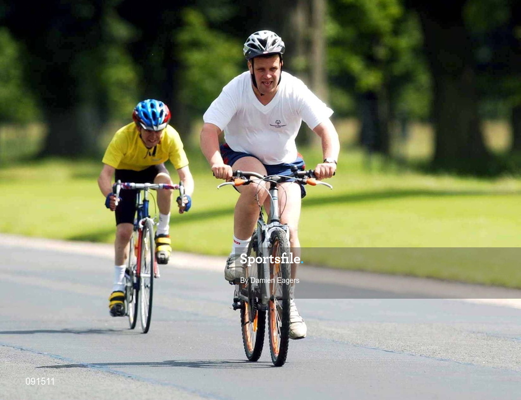 21 June 2002; Stephen Brown, Special Olympics Great Britain, races ahead of David Nicol, Special Olympics Great Britain, during the 5K Road Race during the 2002 Special Olympics Ireland National Games at in Phoenix Park in Dublin. Photo by Damien Eagers/Sportsfile