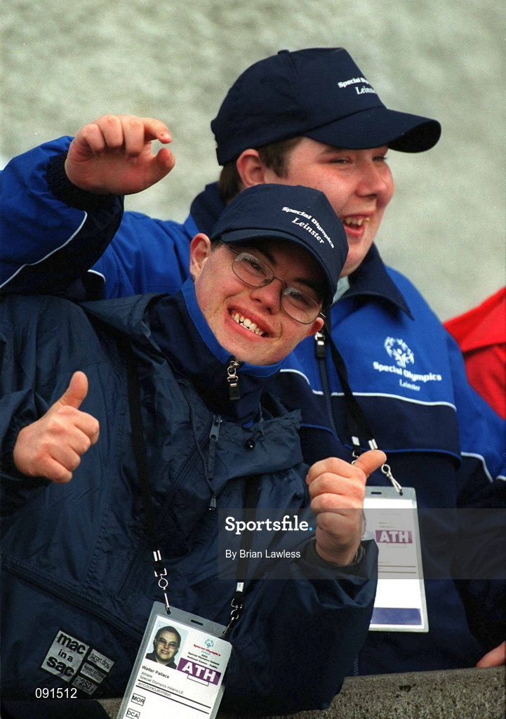 21 June 2002; Special Olympics athletes Walter Pallas, left, and Ciaran Johnson, cheer on fellow contestants during the 2002 Special Olympics Ireland National Games at Morton Stadium in Santry, Dublin. Photo by Brian Lawless/Sportsfile