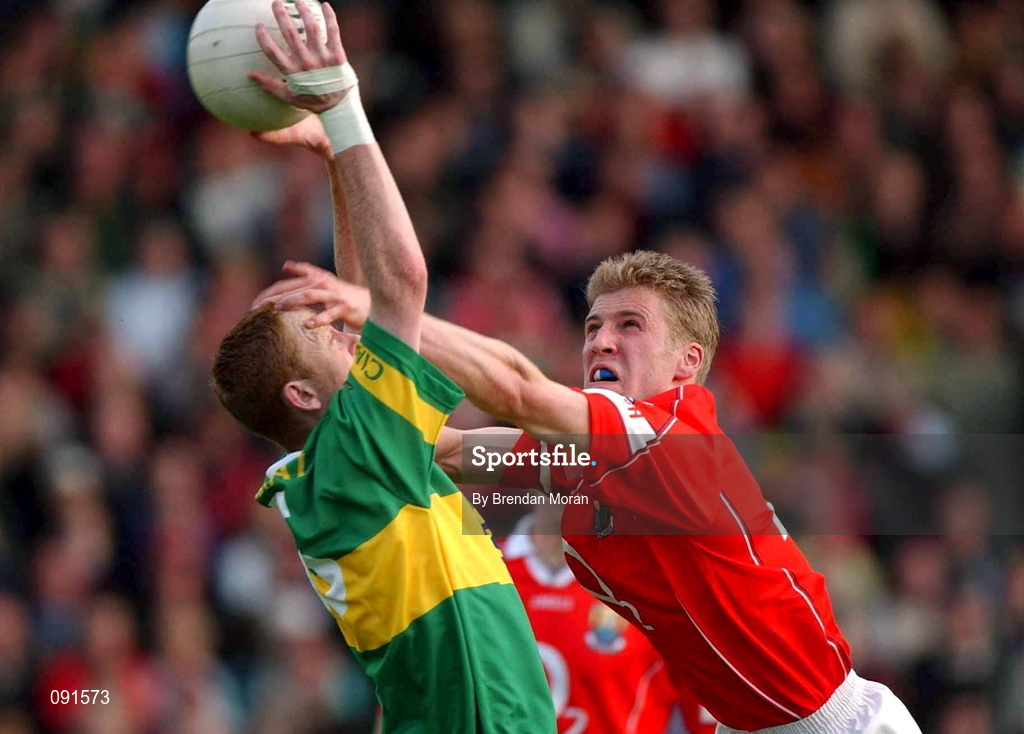 23 June 2002; Colm Cooper of Kerry in action against Cork's Anthony Lynch during the Bank of Ireland Munster Senior Football Championship Semi-Final Replay match between Cork and Kerry at Páirc U’ Chaoimh in Cork. Photo by Brendan Moran/Sportsfile