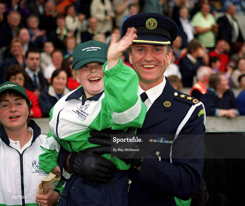 19 June 2002; Special Olympian Brian Doran with Civil Defence Officer for Mayo John Maughan during the 2002 Special Olympics Ireland National Games opening ceremony at Parnell Park in Dublin. Photo by Ray McManus/Sportsfile