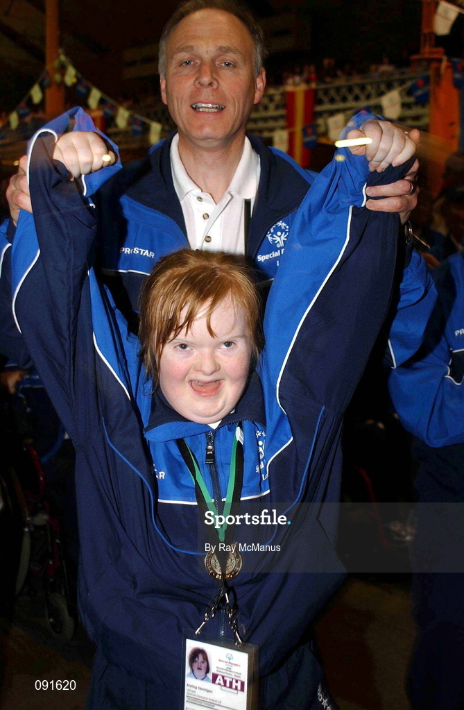 23 July 2002; Special Olympian Aishling Hennigan, a member of the Blackrock Flyers Club, during the 2002 Special Olympics Ireland National Games opening ceremony at Parnell Park in Dublin. Photo by Ray McManus/Sportsfile