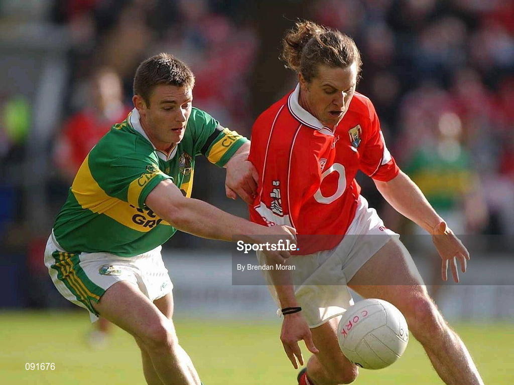23 June 2002; Alan Cronin of Cork in action against Kerry's Enda Galvin during the Bank of Ireland Munster Senior Football Championship Semi-Final Replay match between Cork and Kerry at Páirc U’ Chaoimh in Cork. Photo by Brendan Moran/Sportsfile