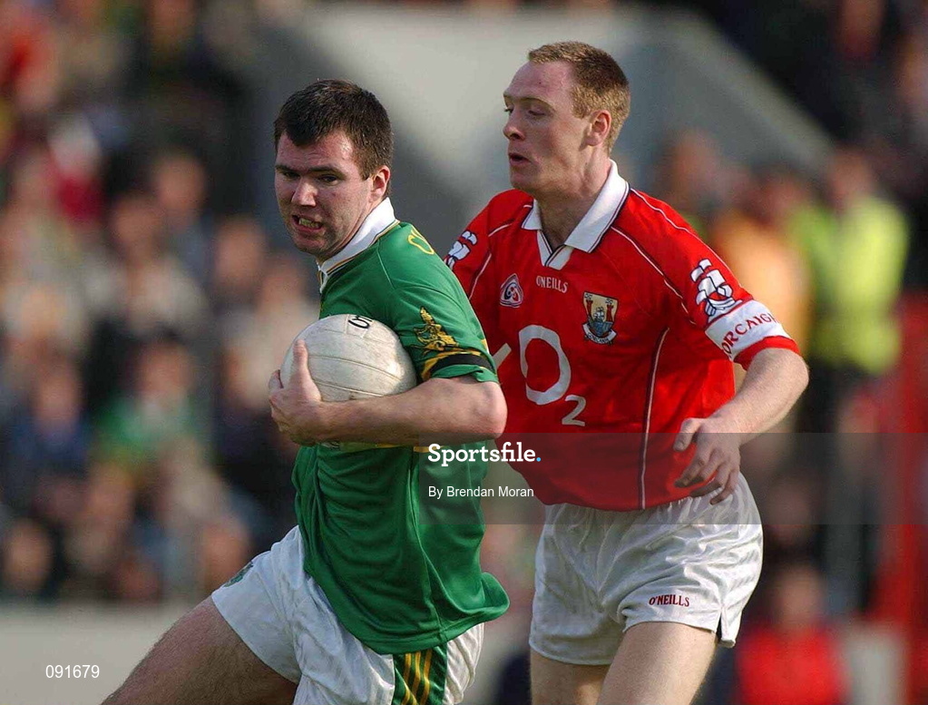 23 June 2002; Michael McCarthy of Kerry in action against Cork's Philip Clifford during the Bank of Ireland Munster Senior Football Championship Semi-Final Replay match between Cork and Kerry at Páirc U’ Chaoimh in Cork. Photo by Brendan Moran/Sportsfile