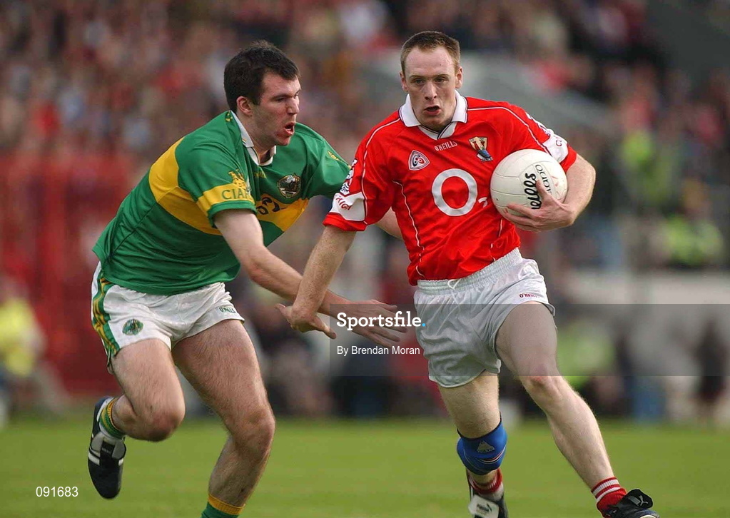 23 June 2002; Philip Clifford of Cork in action against Michael McCarthy of Kerry during the Bank of Ireland Munster Senior Football Championship Semi-Final Replay match between Cork and Kerry at Páirc U’ Chaoimh in Cork. Photo by Brendan Moran/Sportsfile