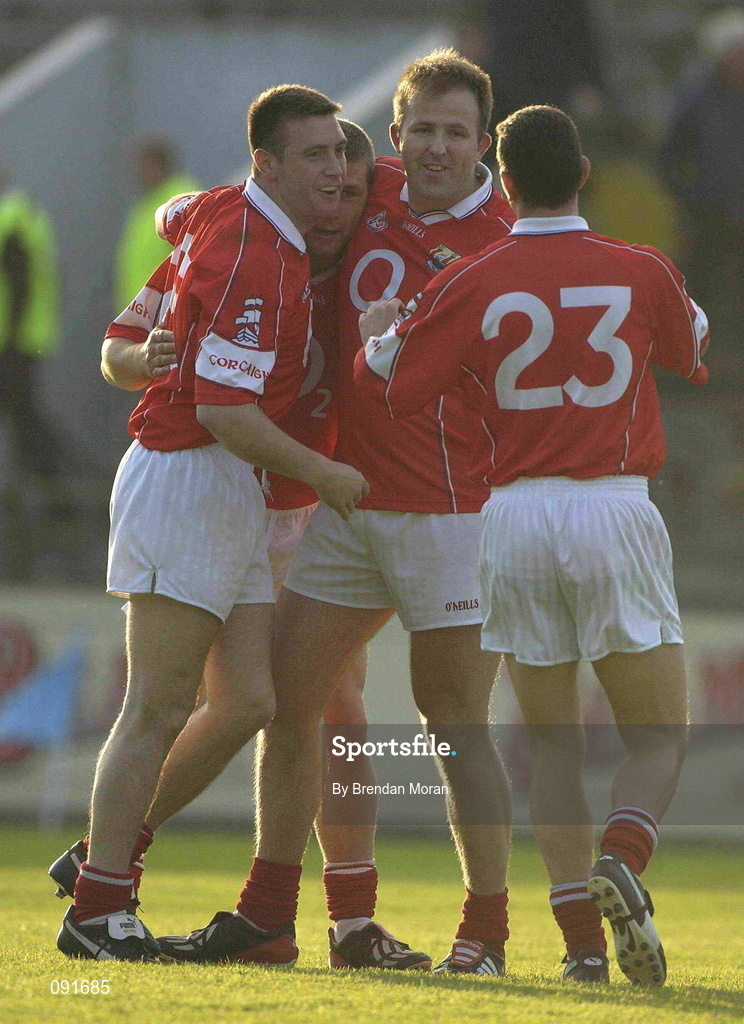 23 June 2002; Cork players, from left, Joe Kavanagh, Diarmuid O'Sullivan, Colin Corkery and Colin Crowley celebrate at the final whistle following their side's victory during the Bank of Ireland Munster Senior Football Championship Semi-Final Replay match between Cork and Kerry at Páirc U’ Chaoimh in Cork. Photo by Brendan Moran/Sportsfile