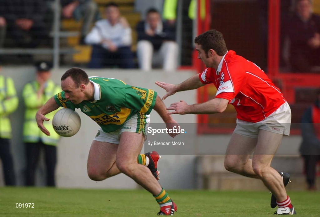 23 June 2002; John Crowley of Kerry in action against Eoin Sexton of Cork during the Bank of Ireland Munster Senior Football Championship Semi-Final Replay match between Cork and Kerry at Páirc U’ Chaoimh in Cork. Photo by Brendan Moran/Sportsfile