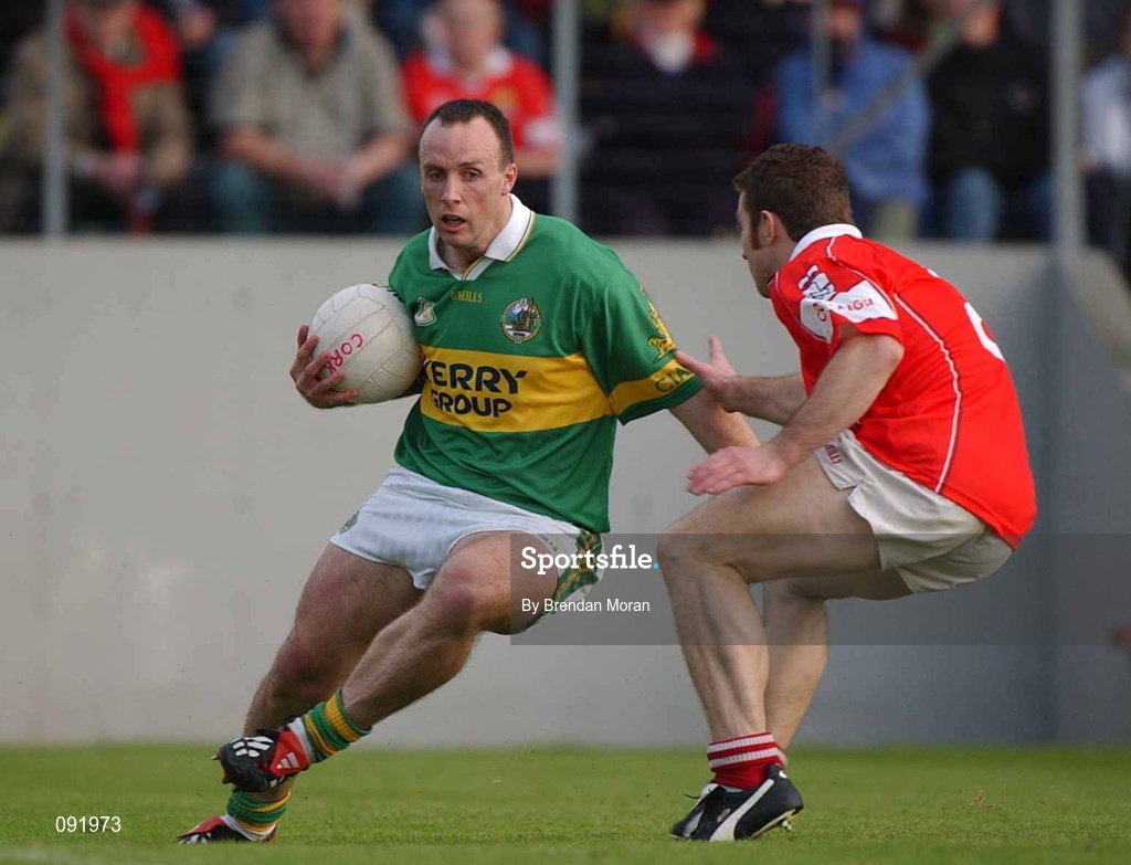 23 June 2002; John Crowley of Kerry in action against Eoin Sexton of Cork during the Bank of Ireland Munster Senior Football Championship Semi-Final Replay match between Cork and Kerry at Páirc U’ Chaoimh in Cork. Photo by Brendan Moran/Sportsfile