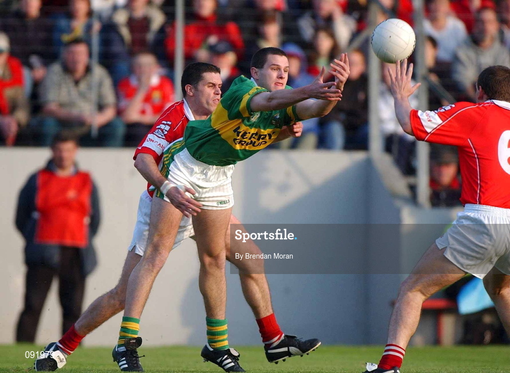 23 June 2002; Eoin Brosnan of Kerry is tackled by Martin Cronin of Cork during the Bank of Ireland Munster Senior Football Championship Semi-Final Replay match between Cork and Kerry at Páirc U’ Chaoimh in Cork. Photo by Brendan Moran/Sportsfile