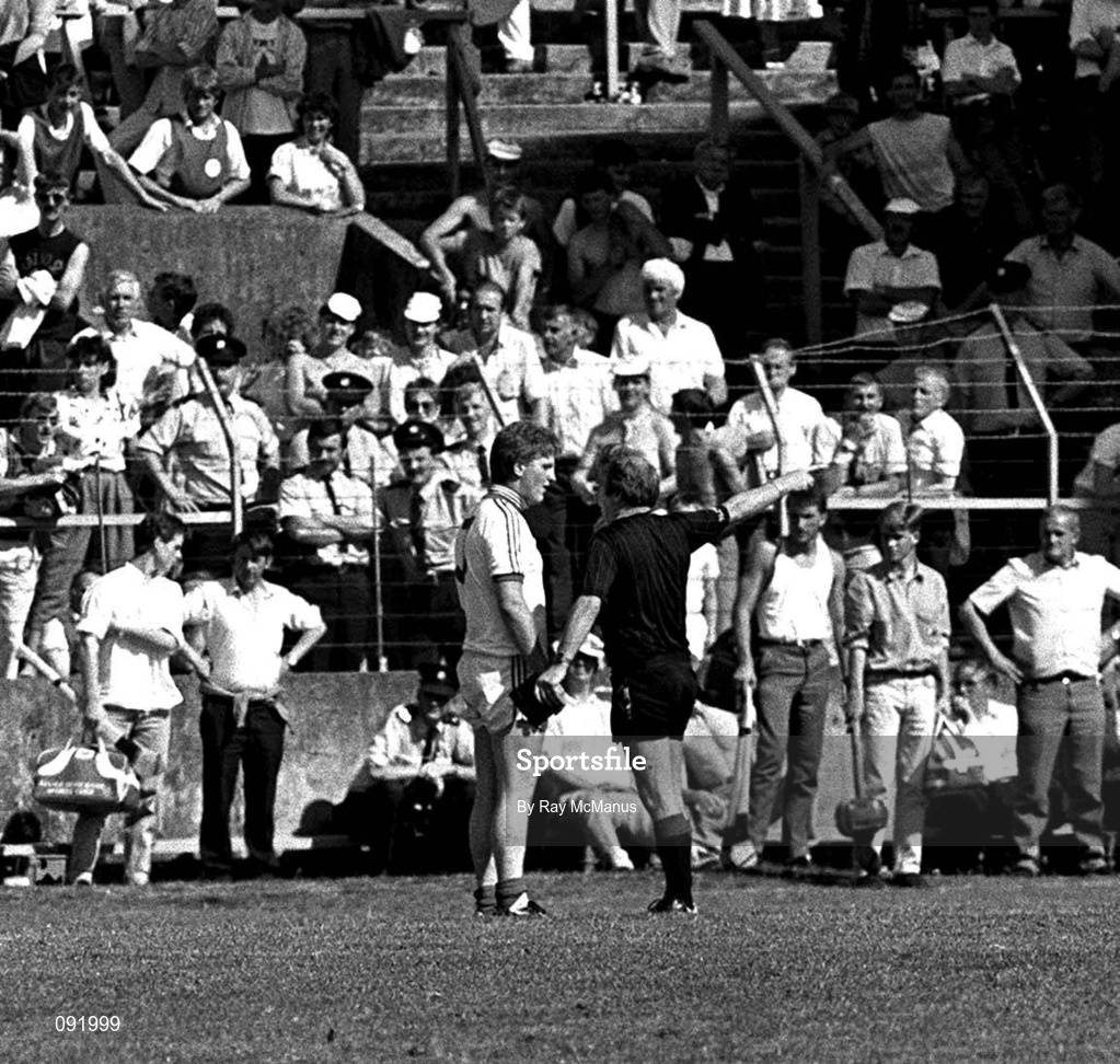 2 July 1989; Waterford's Damien Byrne is sent off by referee Willie Horgan during the Munster Senior Hurling Championship Final match between Tipperary and Waterford at Pairc Ui Chaoimh in Cork. Photo by Ray McManus/Sportsfile