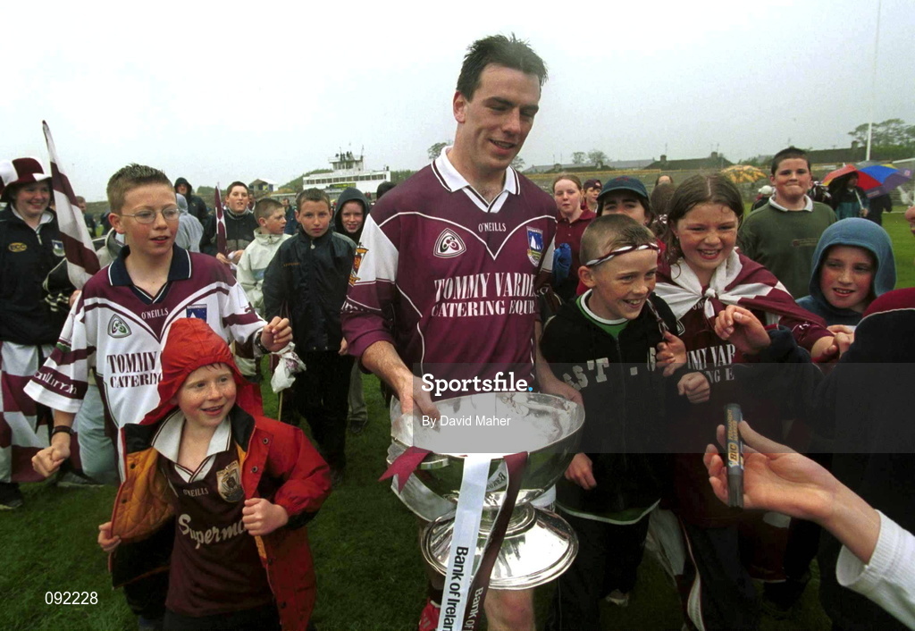 30 June 2002; Galway captain Padraig Joyce celebrates with supporters as he leaves the pitch holding the Nestor Cup following his side's victory during the Bank of Ireland Connacht Senior Football Championship Final match between Galway and Sligo at MacHale Park in Castlebar, Mayo. Photo by David Maher/Sportsfile