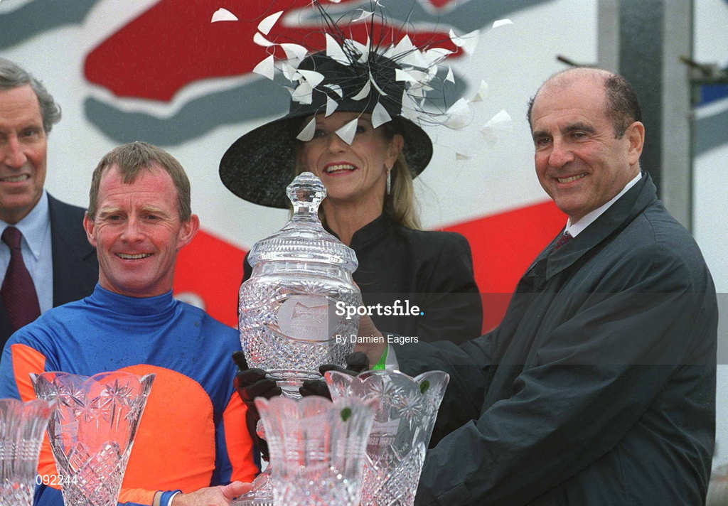 30 June 2002; Joint owners of High Chaparral, Sue Magnier and Michael Tabor, celebrate with Jockey Mick Kinane after winning the Budweiser Irish Derby at The Curragh Racecourse in Kildare. Photo by Damien Eagers/Sportsfile