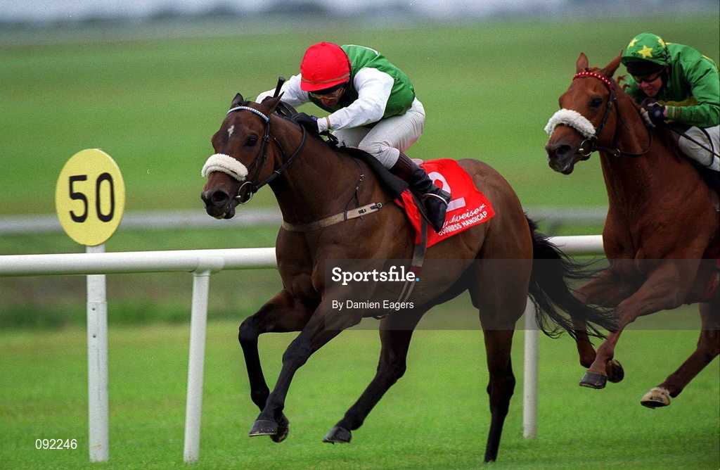 30 June 2002; Social Harmony, with Pat Shanahan up, races clear of Common Kris, with JM O'Dwyer up, on their way to winning the Budweiser Guinness Handicap at The Curragh Racecourse in Kildare. Photo by Damien Eagers/Sportsfile