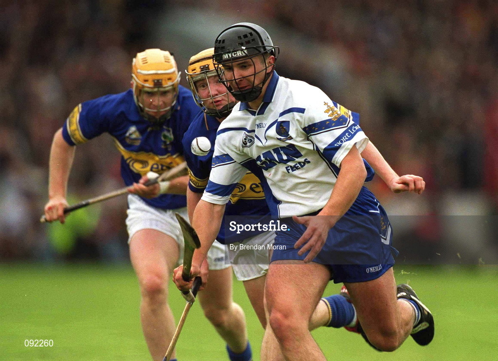 30 June 2002; Seamus Prendergast of Waterford in action against Tipperary players Eamonn Corcoran and Paul Ormonde during the Guinness Munster Senior Hurling Championship Final match between Waterford and Tipperary at Páirc Uí Chaoimh in Cork. Photo by Brendan Moran/Sportsfile