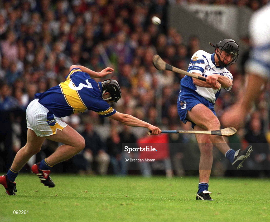 30 June 2002; Seamus Prendergast of Waterford in action against Tipperary's Philip Maher during the Guinness Munster Senior Hurling Championship Final match between Waterford and Tipperary at Páirc Uí Chaoimh in Cork. Photo by Brendan Moran/Sportsfile