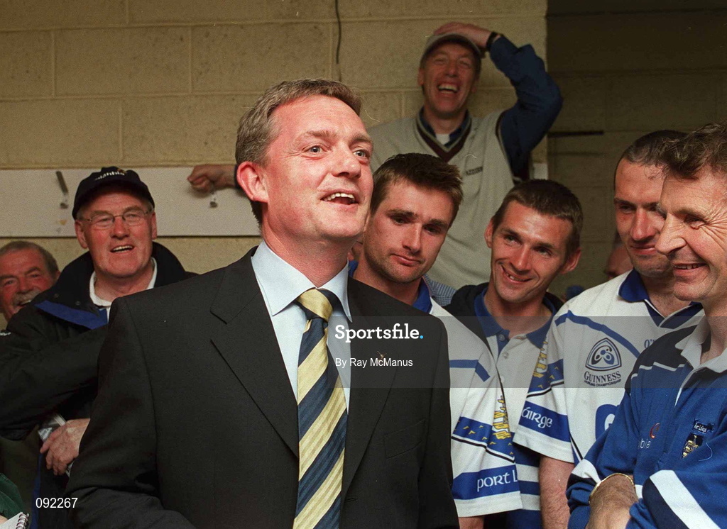 30 June 2002; Tipperary manager Nicholas English congratulates Waterford players in the dressing room following the Guinness Munster Senior Hurling Championship Final match between Waterford and Tipperary at Páirc Uí Chaoimh in Cork. Photo by Ray McManus/Sportsfile