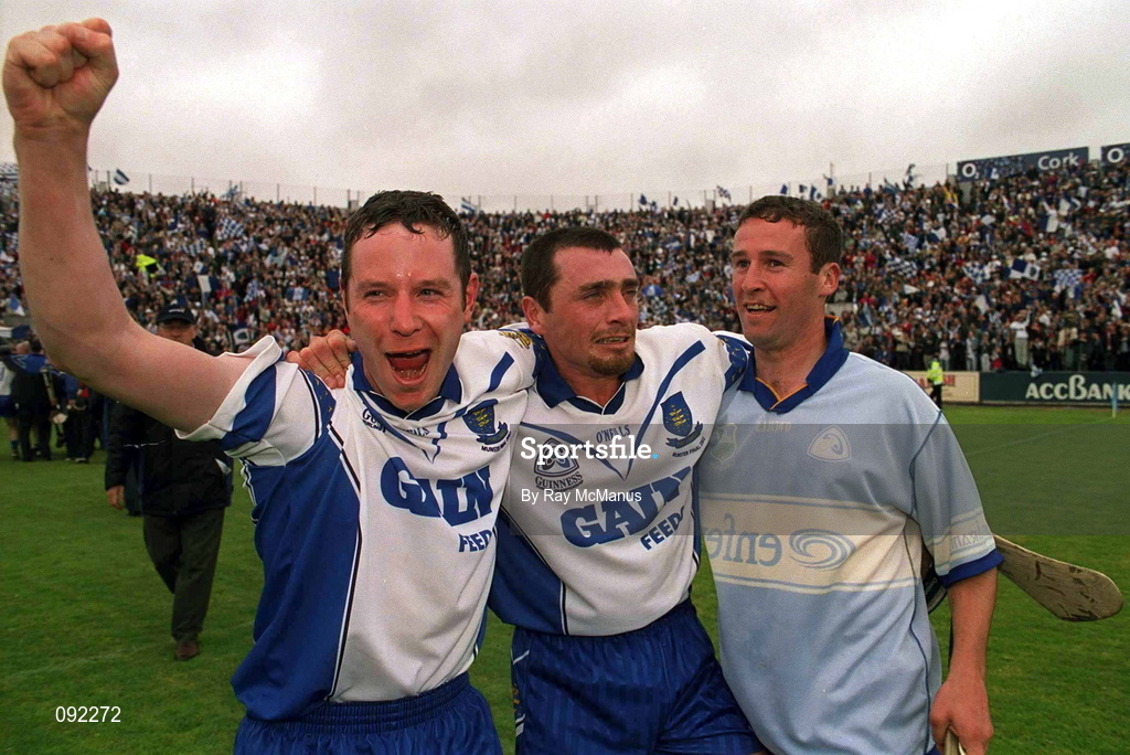 30 June 2002; Waterford players, from left, Eoin Murphy, Brian Greene and Dave Bennett celebrate following their side's victory during the Guinness Munster Senior Hurling Championship Final match between Waterford and Tipperary at Páirc U’ Chaoimh in Cork. Photo by Ray McManus/Sportsfile