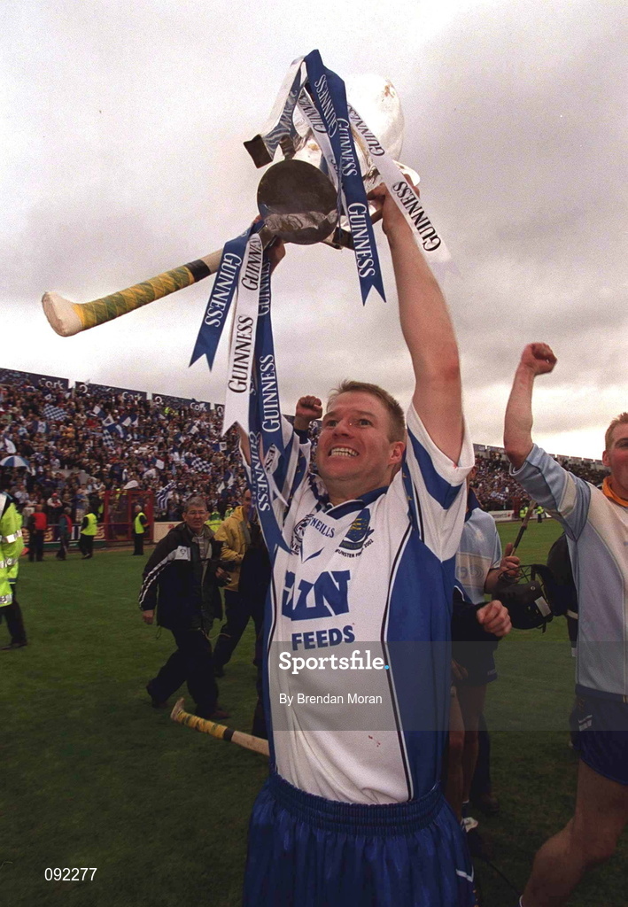 30 June 2002; Waterford's Brian Flannery celebrates with the trophy following his side's victory during the Guinness Munster Senior Hurling Championship Final match between Waterford and Tipperary at Páirc Uí Chaoimh in Cork. Photo by Brendan Moran/Sportsfile