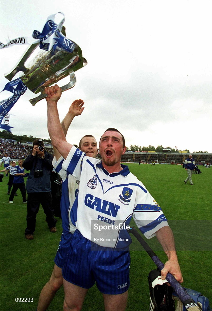 30 June 2002; Brian Greene of Waterford celebrates with the cup following his side's victory during the Guinness Munster Senior Hurling Championship Final match between Waterford and Tipperary at Páirc U’ Chaoimh in Cork. Photo by Brendan Moran/Sportsfile