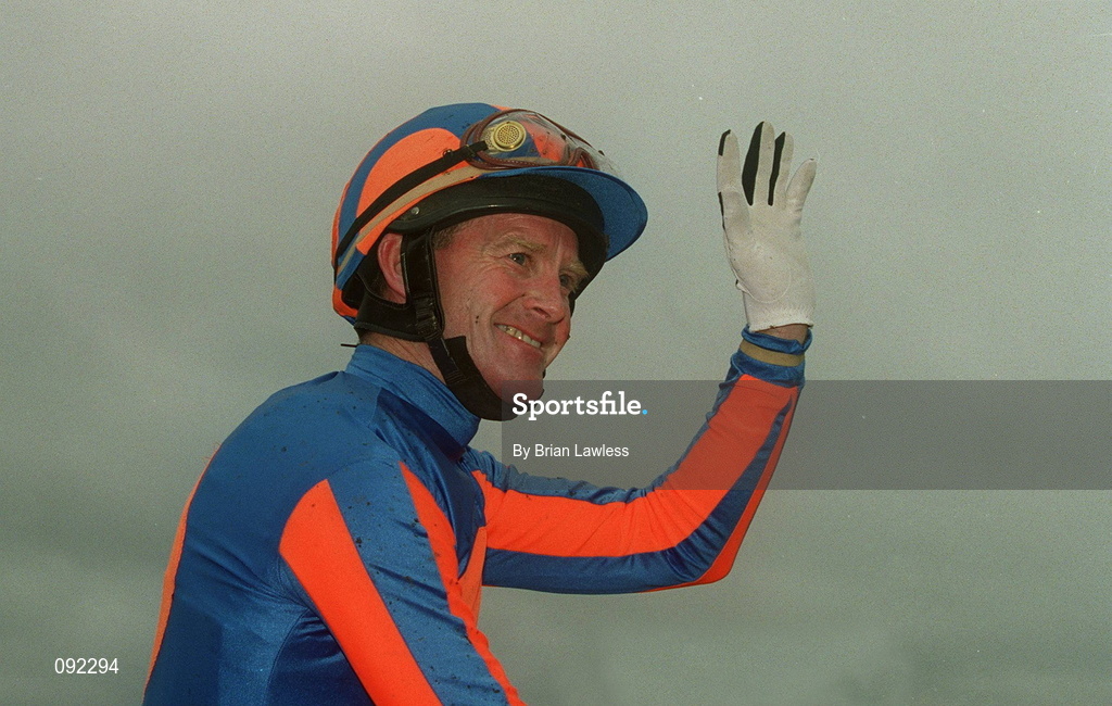 30 June 2002; Jockey Mick Kinane celebrates after riding High Chaparral to victory in the Budweiser Irish Derby at The Curragh Racecourse in Kildare. Photo by Brian Lawless/Sportsfile