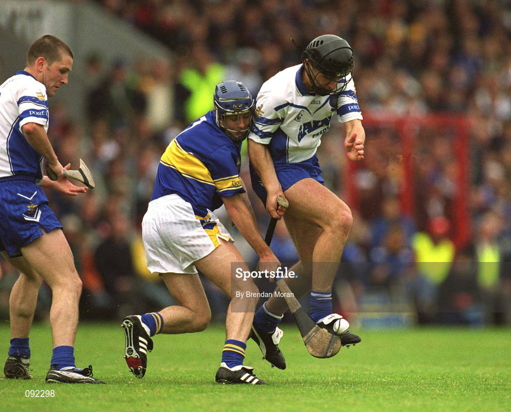 30 June 2002; Seamus Prendergast of Waterford in action against Paul Kelly, Tipperary during the Guinness Munster Senior Hurling Championship Final match between Waterford and Tipperary at Páirc Uí Chaoimh in Cork. Photo by Brendan Moran/Sportsfile