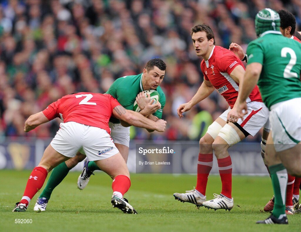 5 February 2012; Rob Kearney, Ireland, is tackled by Huw Bennett, and Sam Warburton, right, Wales. RBS Six Nations Rugby Championship, Ireland v Wales, Aviva Stadium, Lansdowne Road, Dublin. Picture credit: Brian Lawless / SPORTSFILE