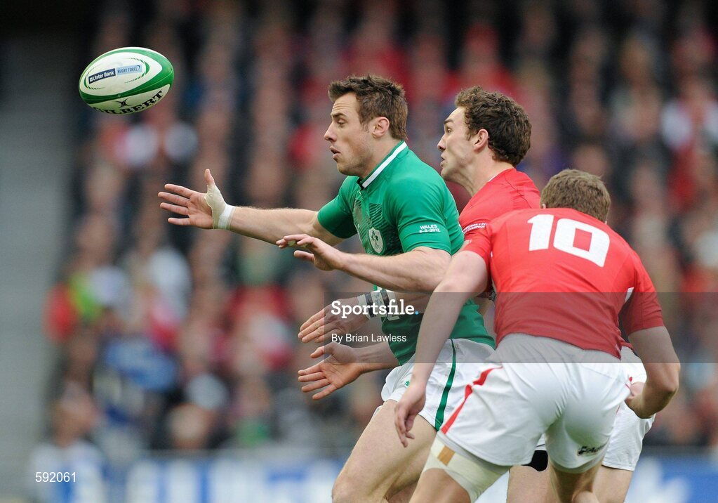 5 February 2012; Tommy Bowe, Ireland, is tackled by Rhys Priestland, 10, and George North, Wales. RBS Six Nations Rugby Championship, Ireland v Wales, Aviva Stadium, Lansdowne Road, Dublin. Picture credit: Brian Lawless / SPORTSFILE