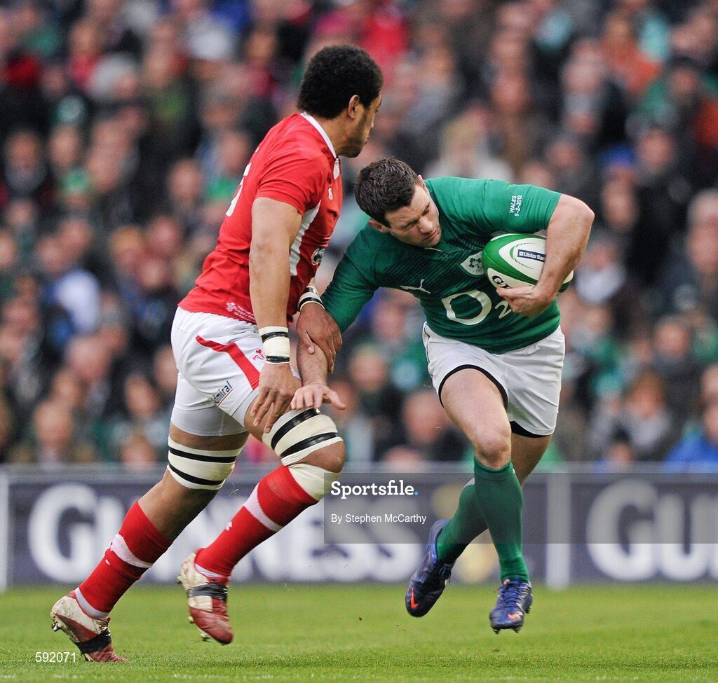 5 February 2012; Fergus McFadden, Ireland, is tackled by Toby Faletau, Wales. RBS Six Nations Rugby Championship, Ireland v Wales, Aviva Stadium, Lansdowne Road, Dublin. Picture credit: Stephen McCarthy / SPORTSFILE