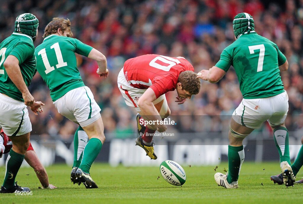 5 February 2012; Rhys Priestland, Wales, in action against Andrew Trimble, left, and Sean O'Brien, Ireland. RBS Six Nations Rugby Championship, Ireland v Wales, Aviva Stadium, Lansdowne Road, Dublin. Picture credit: Brendan Moran / SPORTSFILE