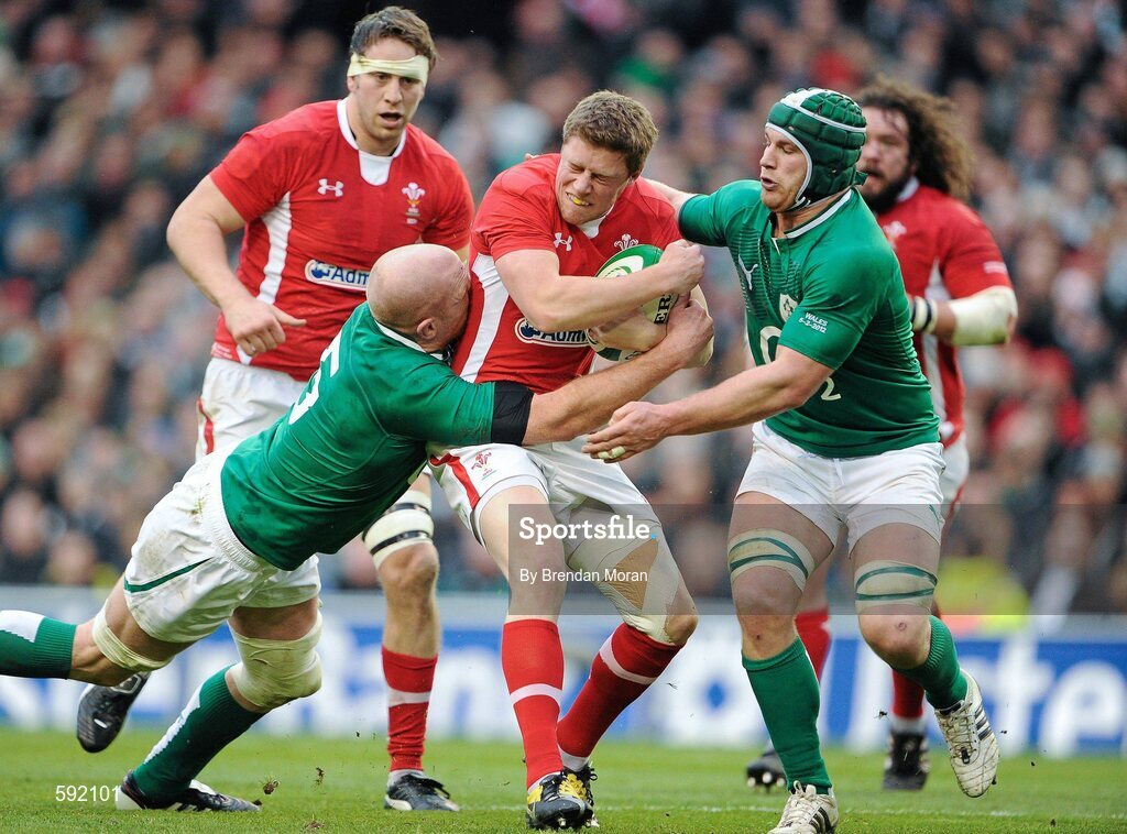 5 February 2012; Rhys Priestland, Wales, is tackled by Paul O'Connell, left, and Sean O'Brien, Ireland. RBS Six Nations Rugby Championship, Ireland v Wales, Aviva Stadium, Lansdowne Road, Dublin. Picture credit: Brendan Moran / SPORTSFILE