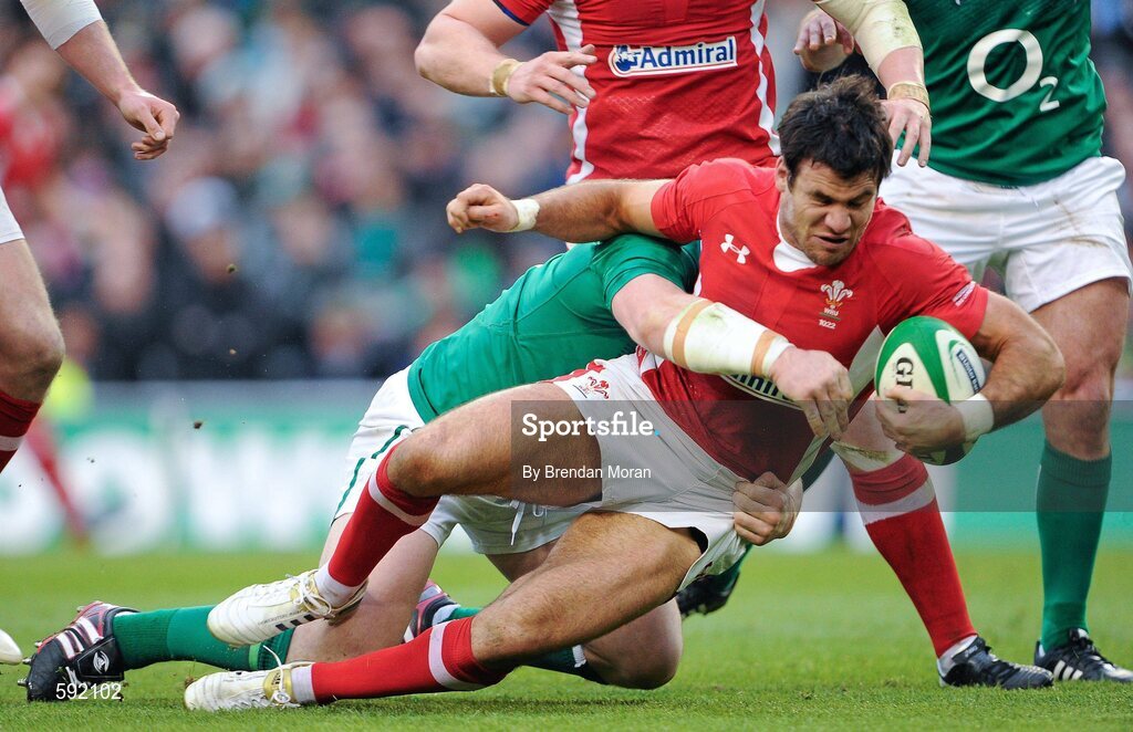 5 February 2012; Mike Phillips, Wales, is tackled by Cian Healy, Ireland. RBS Six Nations Rugby Championship, Ireland v Wales, Aviva Stadium, Lansdowne Road, Dublin. Picture credit: Brendan Moran / SPORTSFILE