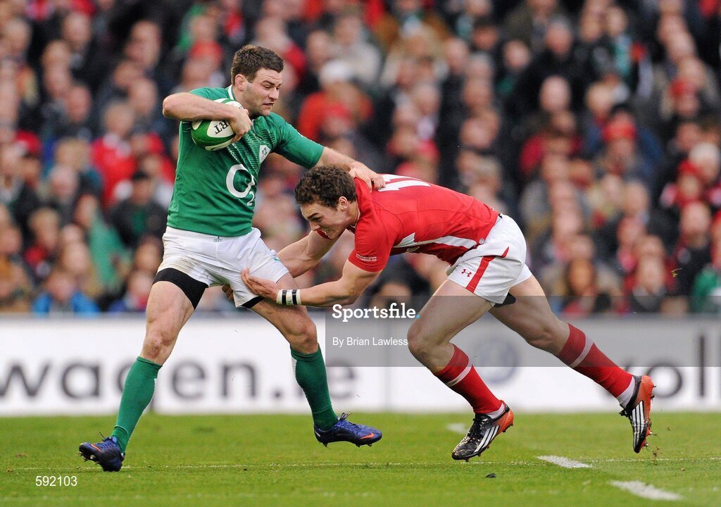 5 February 2012; Fergus McFadden, Ireland, is tackled by George North, Wales. RBS Six Nations Rugby Championship, Ireland v Wales, Aviva Stadium, Lansdowne Road, Dublin. Picture credit: Brian Lawless / SPORTSFILE