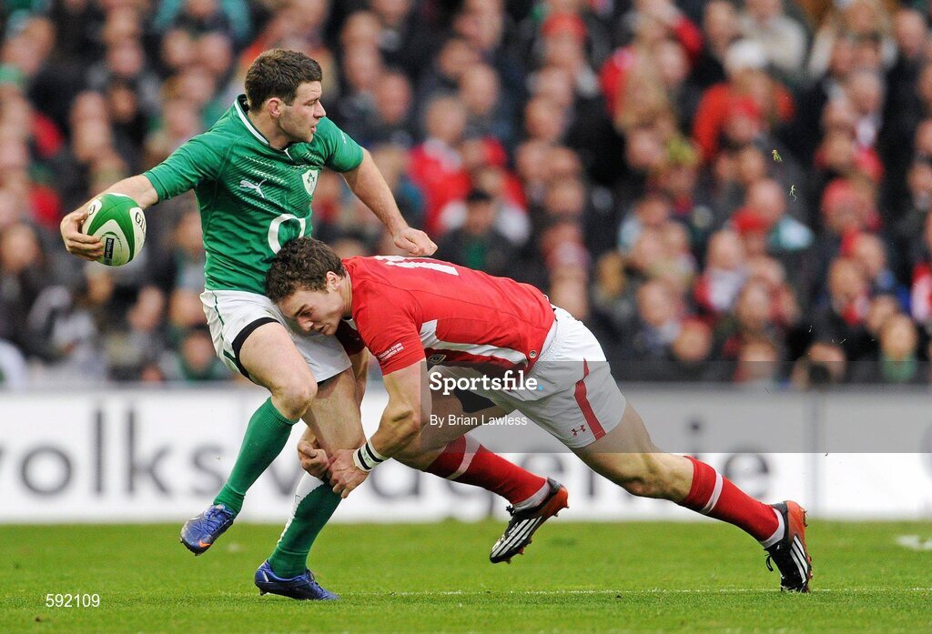 5 February 2012; Fergus McFadden, Ireland, is tackled by George North, Wales. RBS Six Nations Rugby Championship, Ireland v Wales, Aviva Stadium, Lansdowne Road, Dublin. Picture credit: Brian Lawless / SPORTSFILE