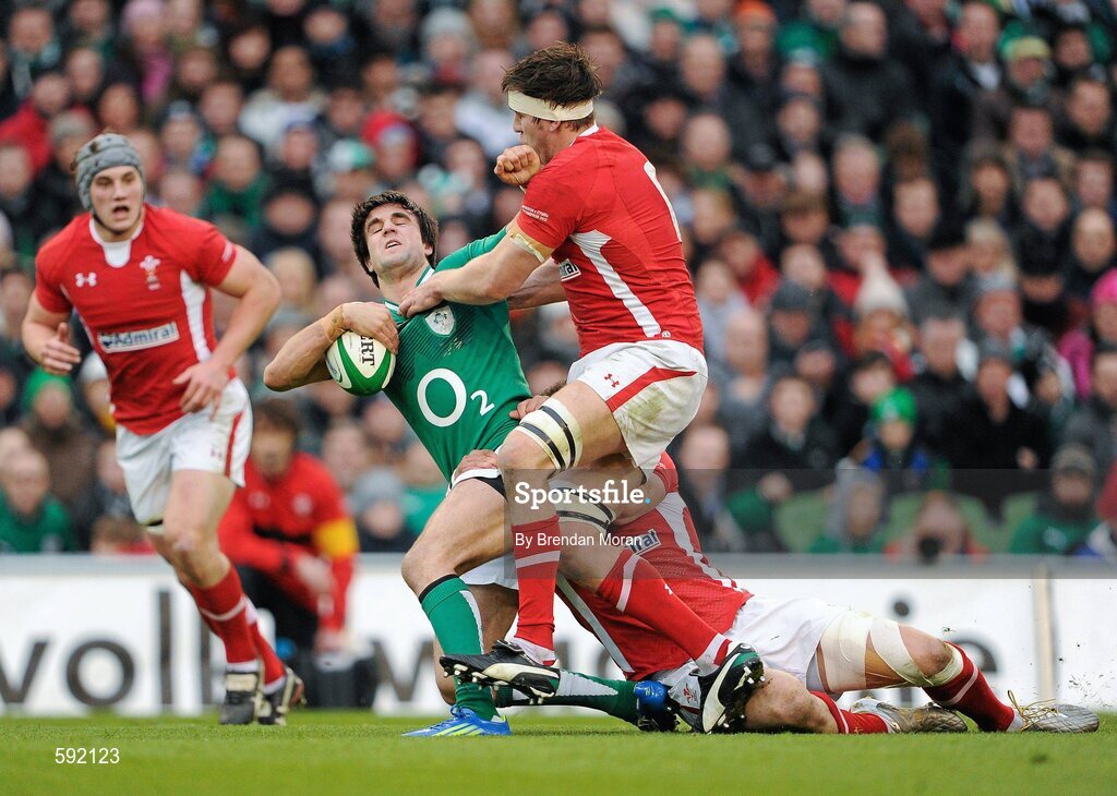 5 February 2012; Conor Murray, Ireland, is tackled by Ryan Jones, 6, and Jamie Roberts, Wales. RBS Six Nations Rugby Championship, Ireland v Wales, Aviva Stadium, Lansdowne Road, Dublin. Picture credit: Brendan Moran / SPORTSFILE
