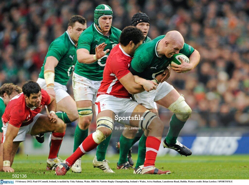 5 February 2012; Paul O'Connell, Ireland, is tackled by Toby Faletau, Wales. RBS Six Nations Rugby Championship, Ireland v Wales, Aviva Stadium, Lansdowne Road, Dublin. Picture credit: Brian Lawless / SPORTSFILE