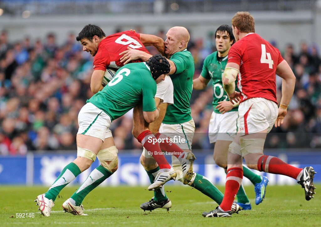 5 February 2012; Mike Phillips, Wales, is tackled by Stephen Ferris and Paul O'Connell, right, Ireland. RBS Six Nations Rugby Championship, Ireland v Wales, Aviva Stadium, Lansdowne Road, Dublin. Picture credit: Brian Lawless / SPORTSFILE