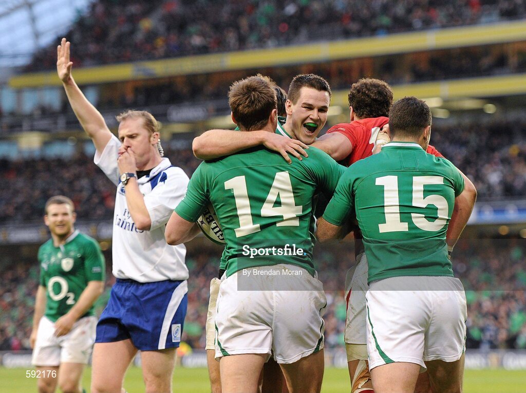 5 February 2012; Jonathan Sexton and Rob Kearney, Ireland, congratulate team mate Tommy Bowe, 14, after he scored Ireland's second try. RBS Six Nations Rugby Championship, Ireland v Wales, Aviva Stadium, Lansdowne Road, Dublin. Picture credit: Brendan Moran / SPORTSFILE